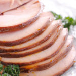 Baked Ham with Brown Sugar and Mustard Glaze - ham heaven! The deep, smoky flavor of ham meets the sweet and tangy flavor of borwn sugar and mustard. It's as easy as 1-2-3