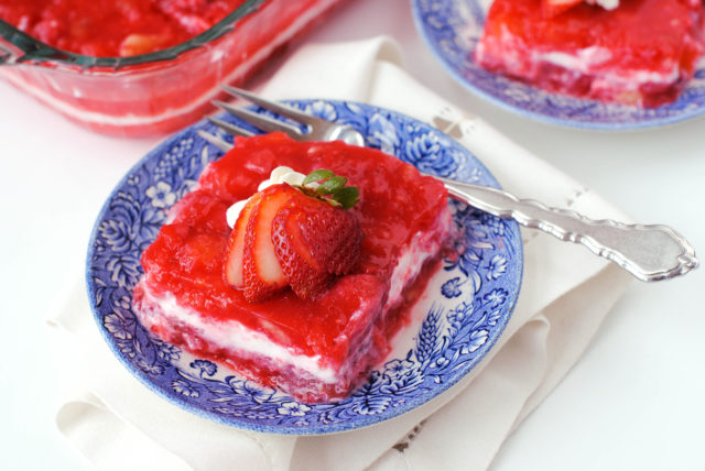 Strawberry, Banana, Pineapple Jello Salad - The sweetness of fruit and Jell-O is complimented by the tang of sour cream. Ribbons of color are great year round.