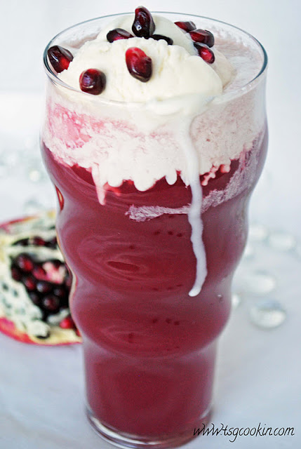 Pomegranate-Orange Ice Cream Float - The irresistible tart and tangy flavors of pomegranate and orange juices take on a touch of richness with a scoop of velvety vanilla ice cream.