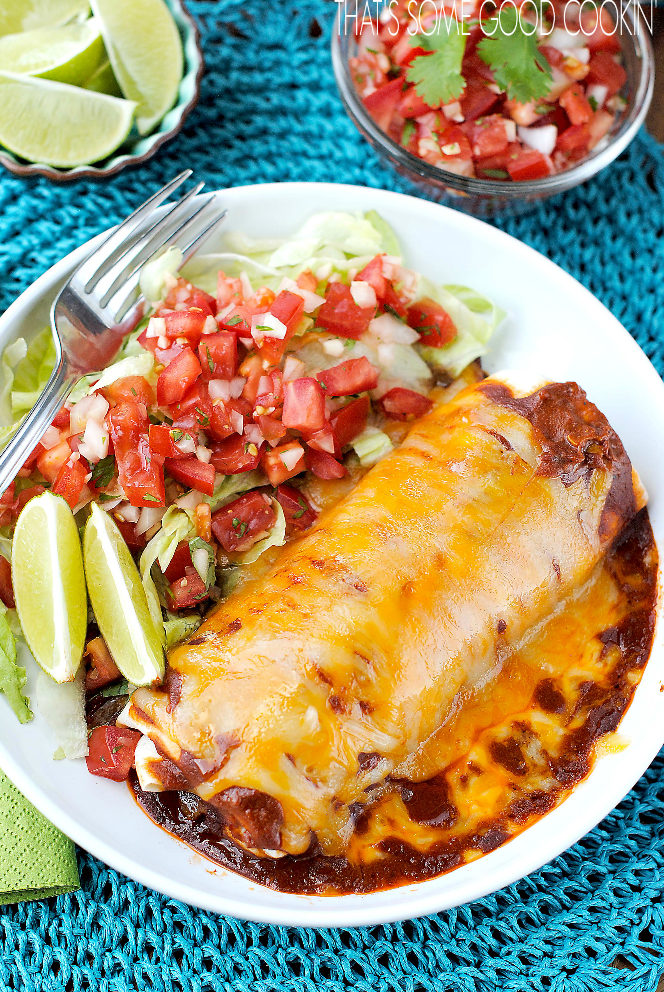 Smothered Burritos | that's some good cookin'--burrito filled with seasoned ground beef, beans and rice, then topped with spicy sauce and lots of cheese