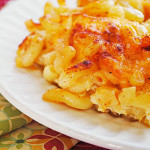 Macaroni Pie - An old Southern classic, Macaroni Pie, originated in Barbados. It is made with cooked pasta, cheese cubes, milk, eggs and butter. Typically it is seasoned with salt, pepper and paprika, then baked in the oven.
