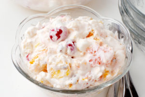 Ambrosia - Its name means food of the Gods. This is one of those recipes that has been around for generations. , toasted pecans and maraschino cherries are combined with whipped cream.