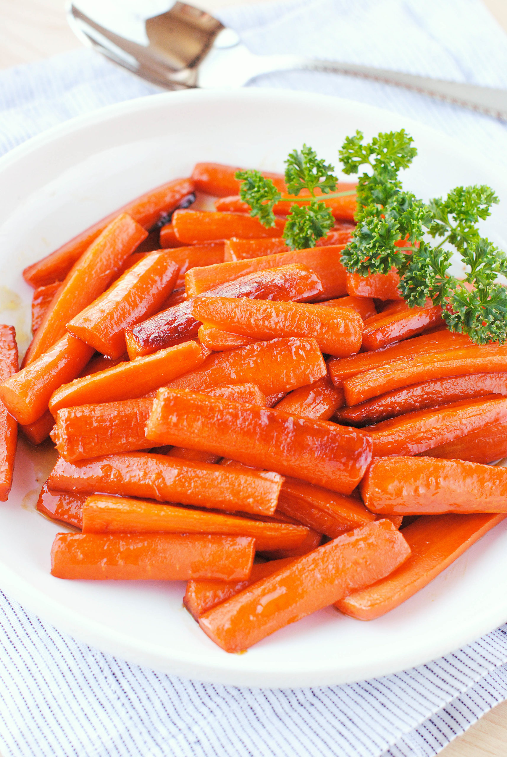 Glazed Carrots - super simple to make. Cook the carrots in a little butter, sprinkle with salt, then finish with a bit of brown sugar.