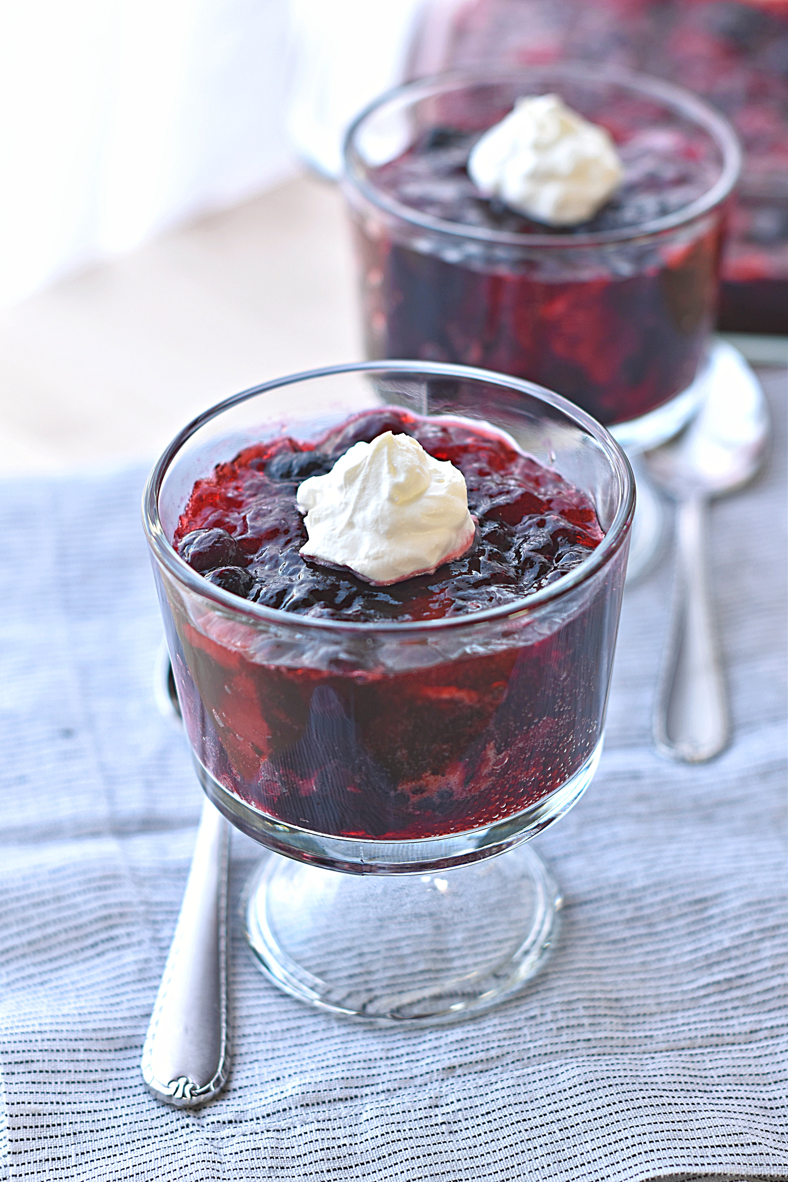 Very Berry Fizzy Jell-O Salad. So easy, filled with berries of your choice and a kick of fizz from club soda.